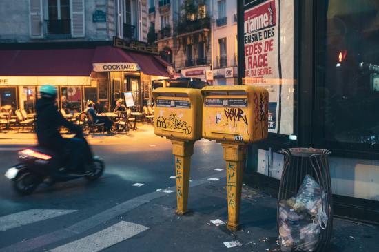 man on scooter in French city