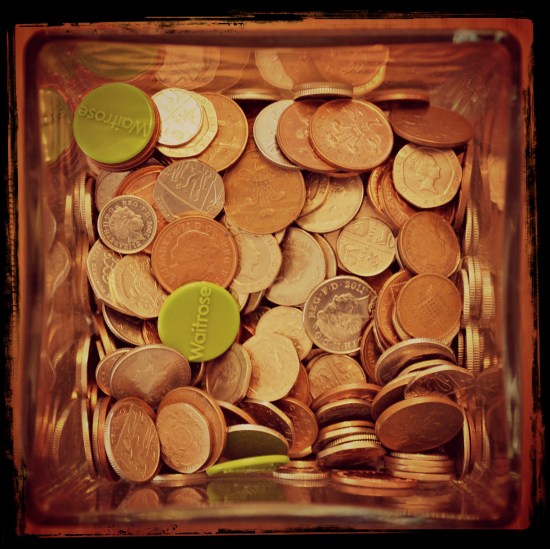 coins glass jar full of coins