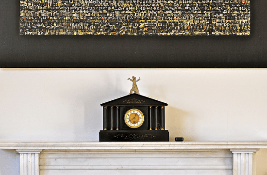 clock on marble fireplace