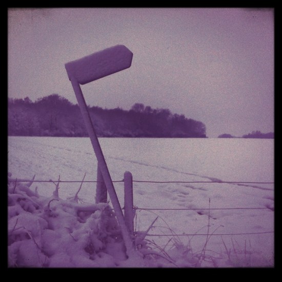 signpost in snow