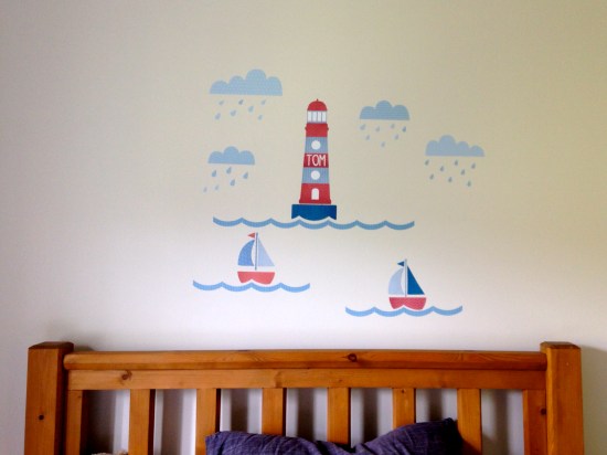 A child's bedroom wall covered with Tinyme Lighthouse themed wall stickers